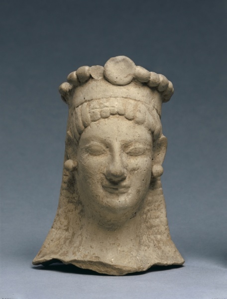 Woman's Head with Crown and Earrings