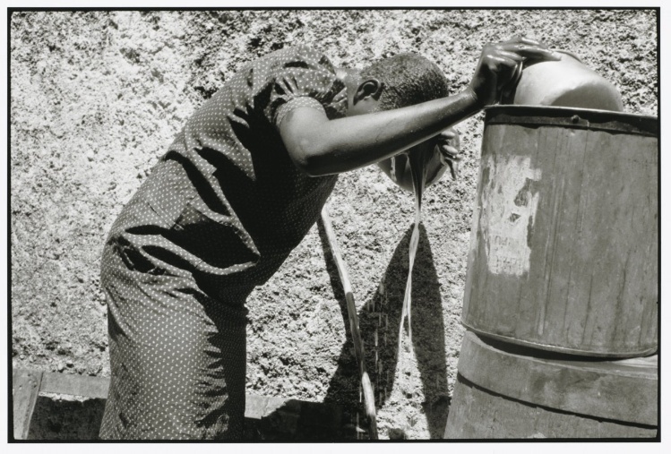 Woman Washing with Pot of Water, Haiti