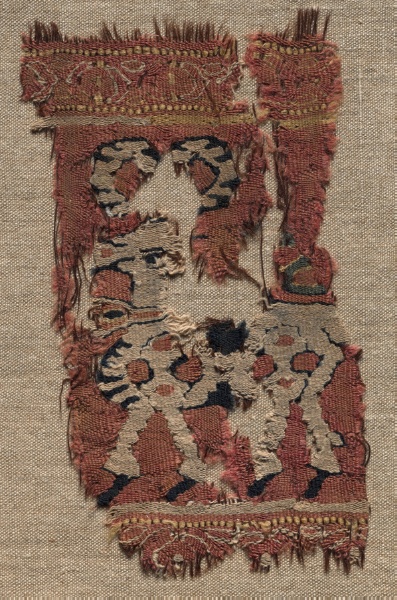 Fragment (from a Garment?)