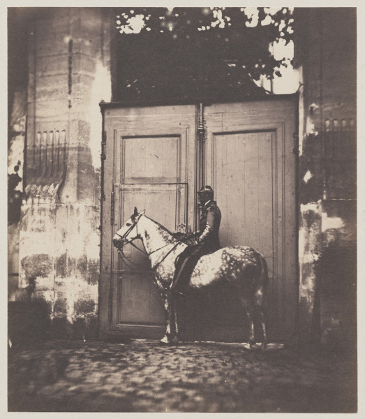 Black Horseman in Front of a Doorway