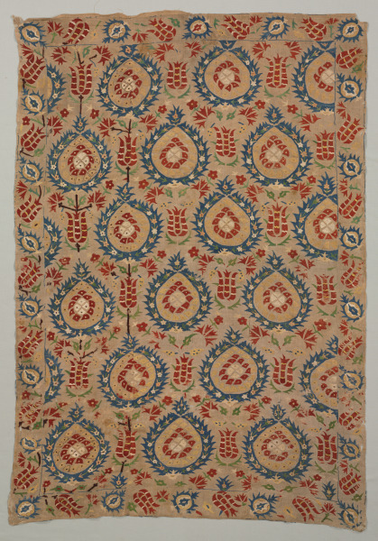 Embroidered quilt with pomegranates and tulips