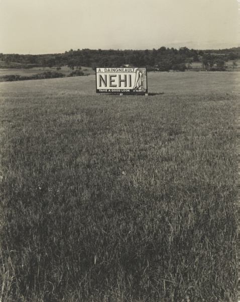 'NEHI' Billboard in a Field