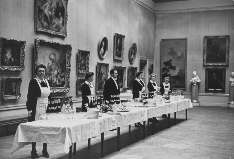Nobel Prizes: Waitress Behind Table Set with Champagne Bottles and Flutes, Stockholm