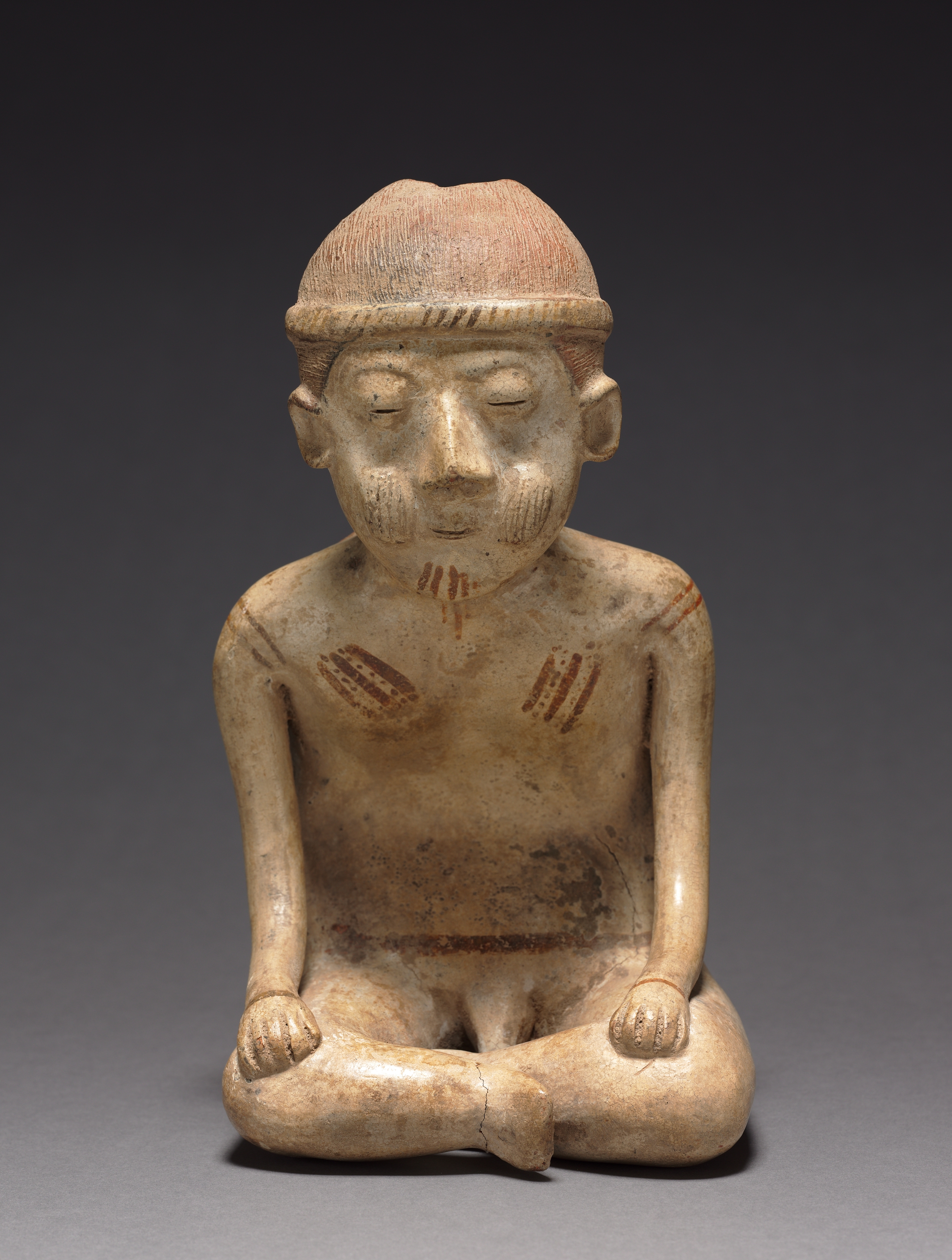 Seated Male Figure with Backrest