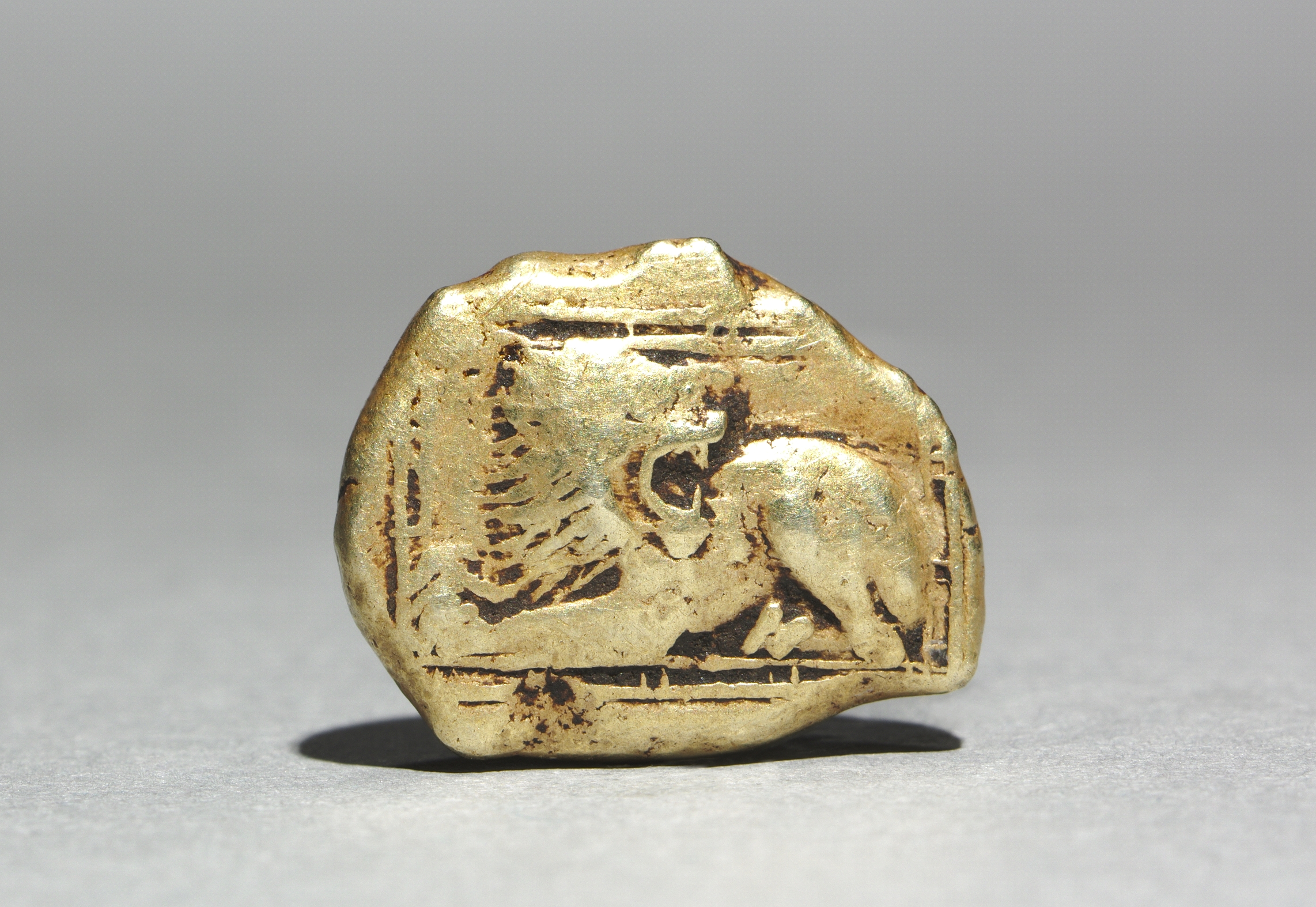Stater: Lion, crouching, l., looking behind, within frame (obverse)