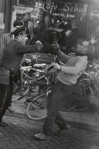 Policeman hits a protestor, Amsterdam, Holland